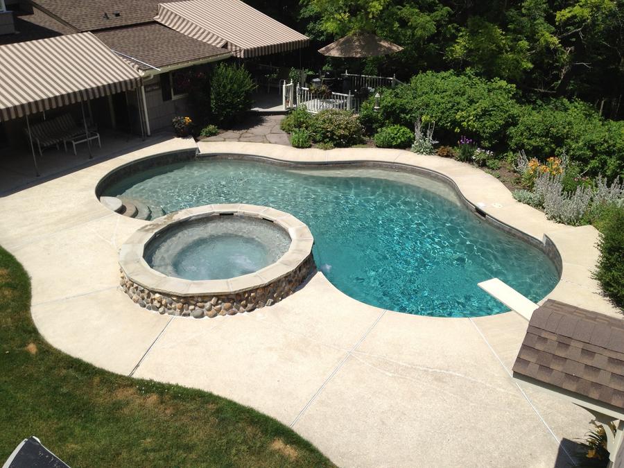 Pebble Finish, New Stone Face Spa, Tile & Bench Renovation