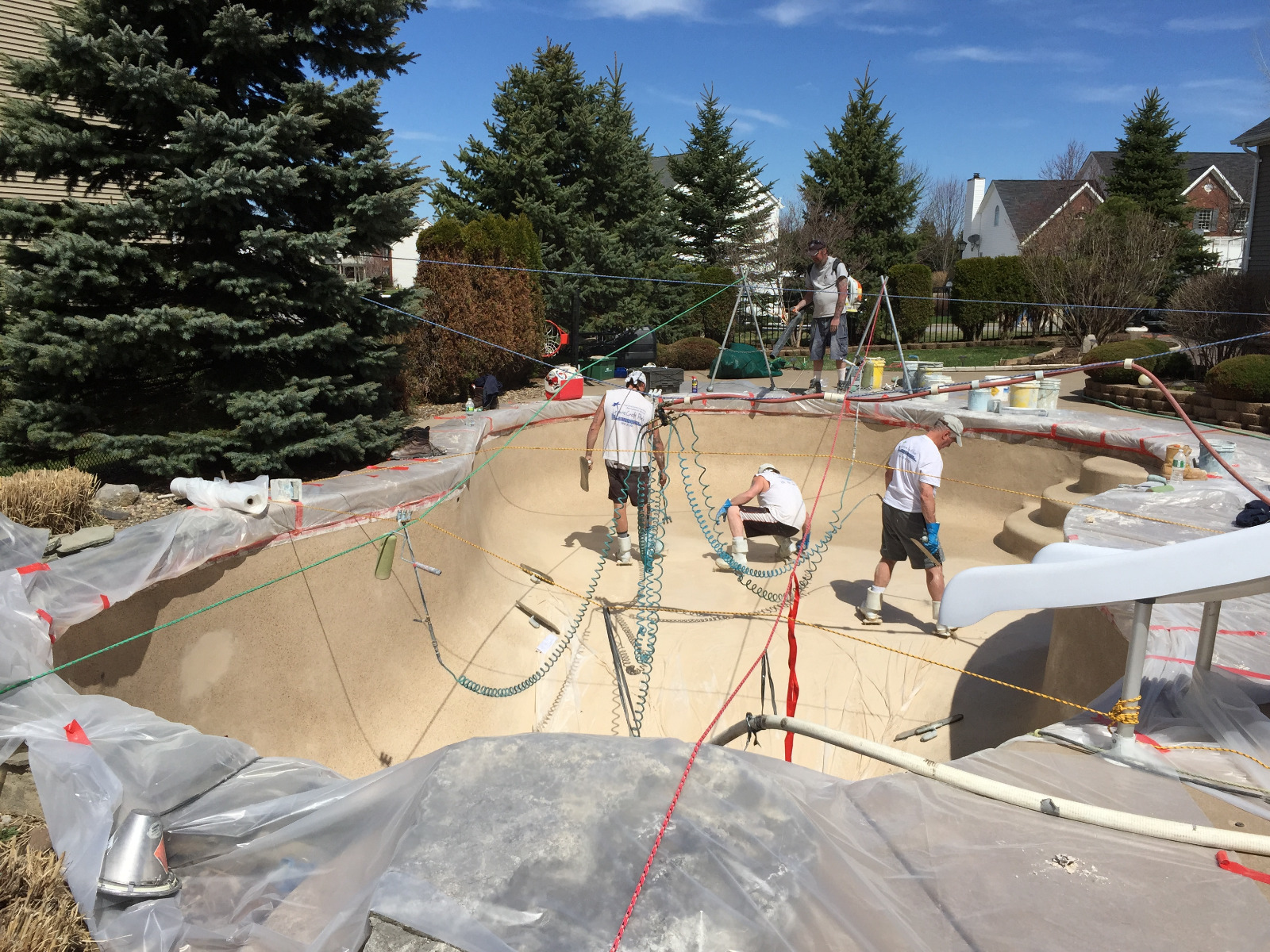 Leisure Craft Pools team renovating a pool